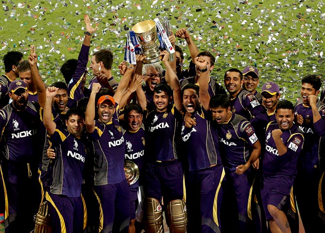 Kolkata Knight Riders players celebrate with the IPL trophy