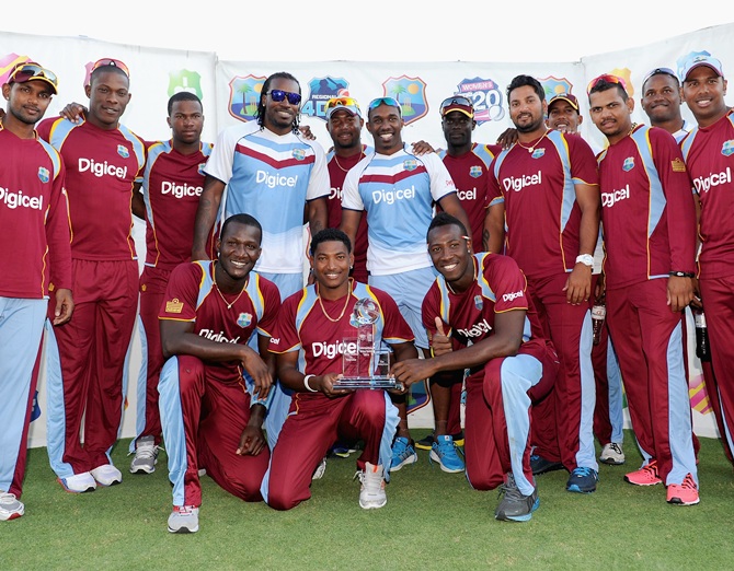 The West Indies celebrate after winning the T20 International series against England at Kensington