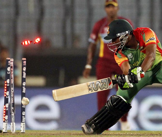 Bangladesh batsman Sohag Gazi is bowled during the match against West Indies in the ICC World T20.
