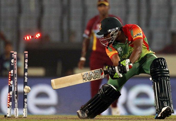 Bangladesh's Sohag Gazi is bowled during the match against West Indies in the World T20.