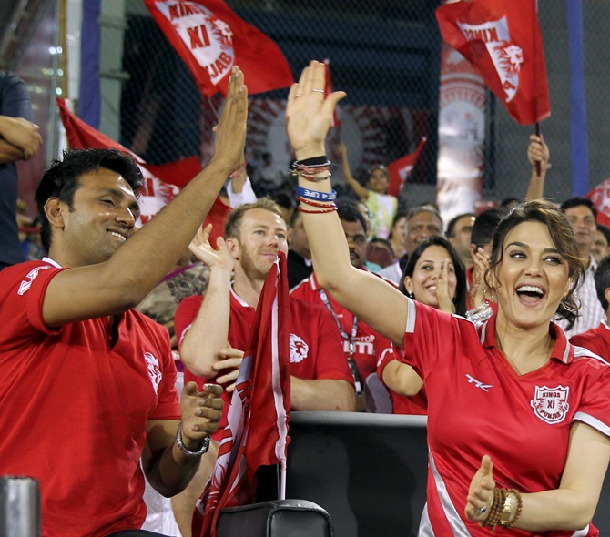 Preity Zinta celebrates with team officials
