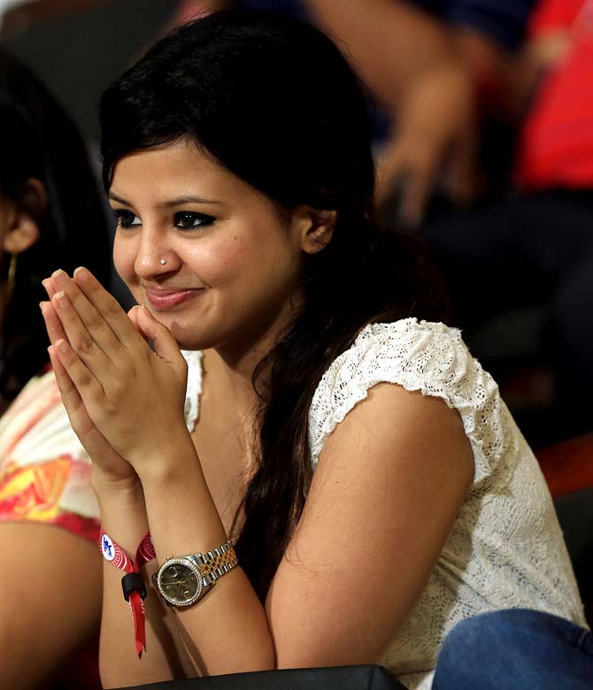 Sakshi Dhoni cheers from the stands