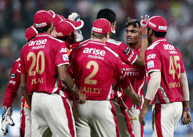  Kings XI Punjab players celebrate after Sandeep Sharma took the wicket of Murali Vijay