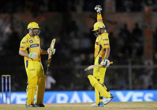 Suresh Raina celebrates with David Hussey after winning the game for Chennai.