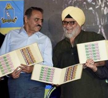 Bhagwat Chandrasekhar (left) and Bishan Singh Bedi release a postal stamp to commemorate 150 years of the Eden Gardens