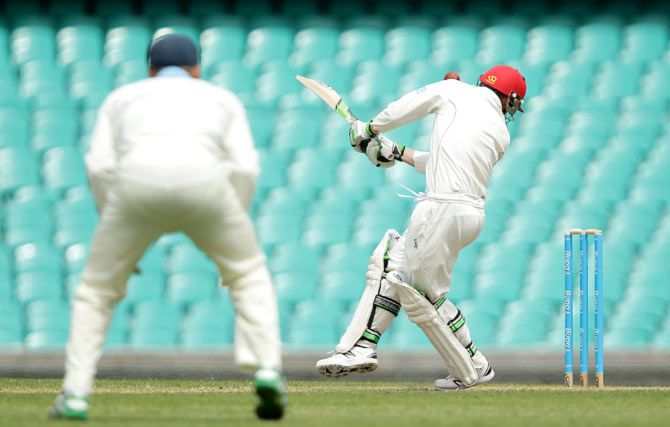 Phillip Hughes of South Australia is struck in the head by a short delivery