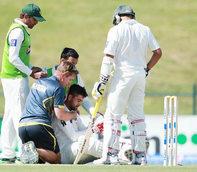 Ahmed Shehzad of Pakistan is injured after receiving a bouncer