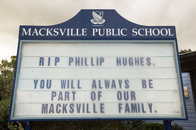 A signboard at St Patricks Primary School displays a message in memory of Australian cricketer Phillip Hughes in his hometown Macksville, Australia