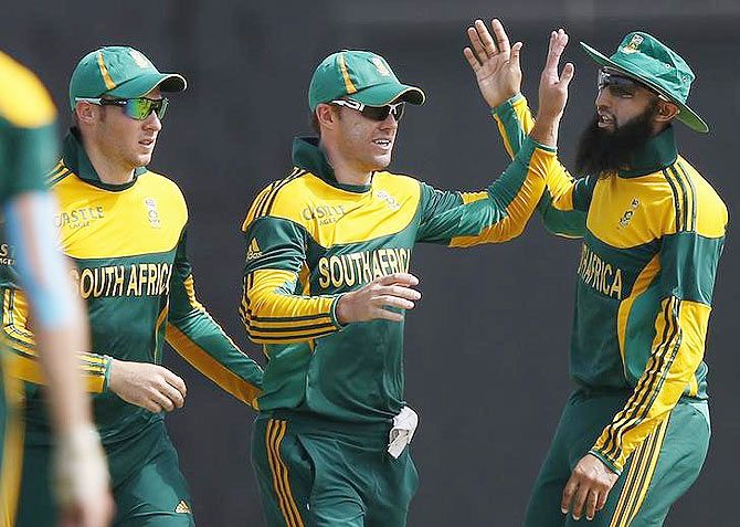 South African cricketers celebrate