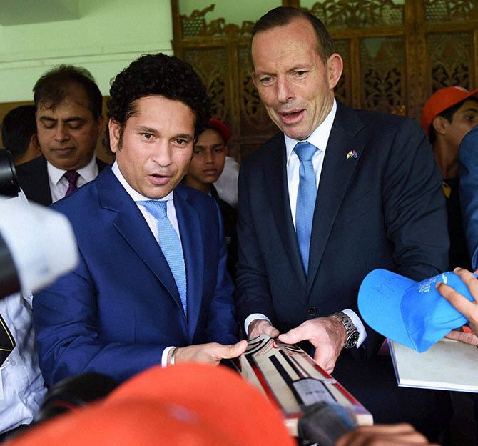 Sachin Tendulkar and Australian Prime Minister Tony Abbott during an interactive session with children at Cricket Club of India (CCI) in Mumbai on Thursday