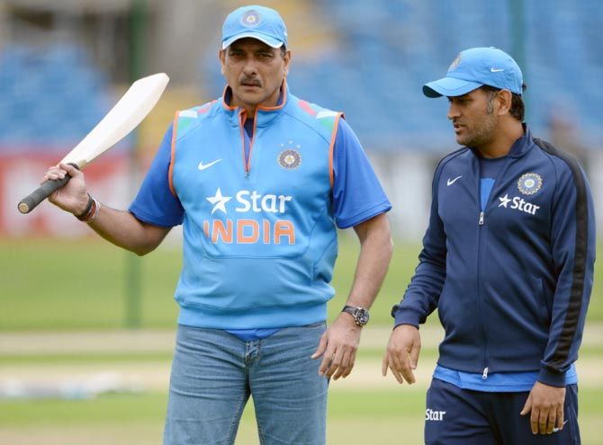Ravi Shastri (left) with India captain Mahendra Singh Dhoni