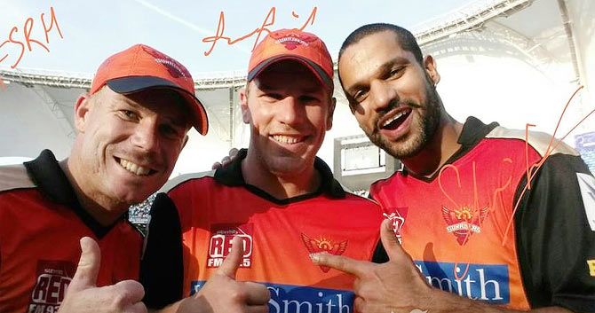 Sunrisers Hyderabad captain David Warner with teammate Shikhar Dhawan