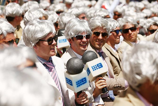 Australian fans dressed as Richie Benaud at Sydney Cricket Ground on January 4, 2014