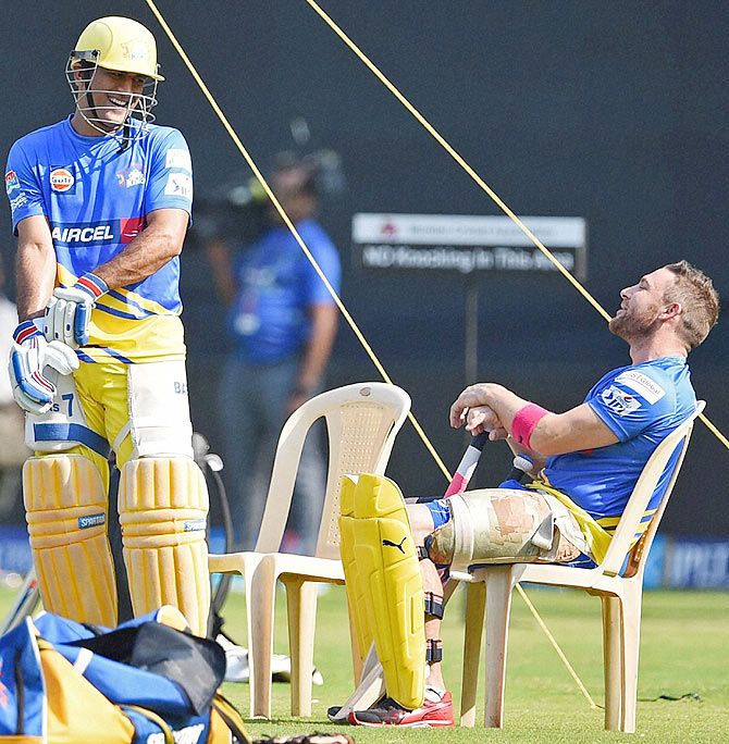 Chennai Super Kings players Mahenndra Singh Dhoni and Brendon McCullum during a practice session