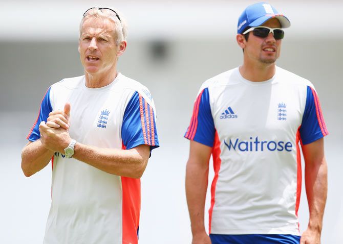 England captain Alastair Cook (right) alongside team coach Peter Moores during a nets session at the National Cricket Ground Stadium in St George's, Grenada, on Monday