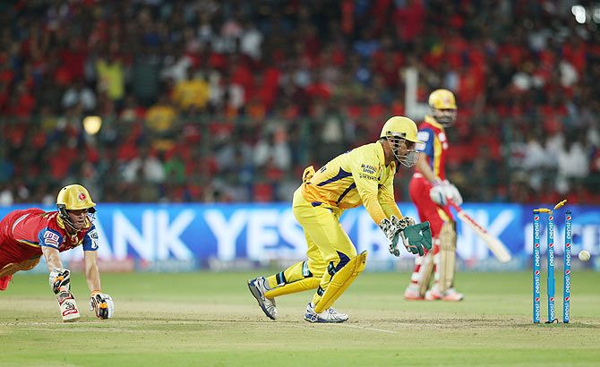 RCB's AB de Villiers is run out by MS Dhoni during their IPL match on Wednesday