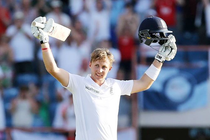 England's Joe Root celebrates his century against the West Indies on Day 3 of the second Test at the National Cricket Stadium in St George's, Grenada, on Thursday