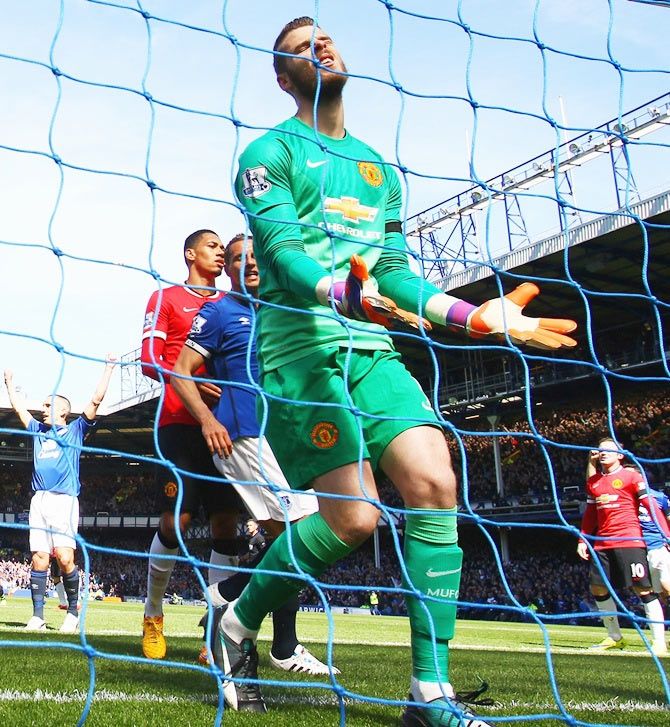 Goalkeeper David De Gea of Manchester United reacts as John Stones of Everton (not pictured) scores during their English Premier League match on Sunday. United lost the match 3-0