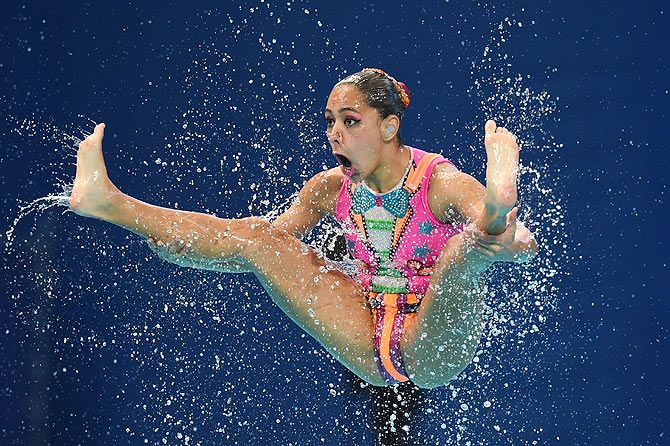 A member of the Mexico team competes in the Women's Team Free Synchronised Swimming Preliminary on Day 4 of the 16th FINA World Championships at the Kazan Arena in Kazan, Russia, on July 28