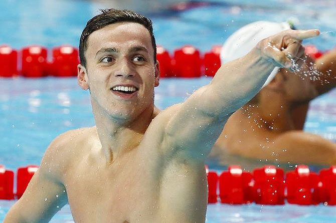 First placed, Britain's James Guy celebrates after the men's 200m freestyle final at the Aquatics World Championships in Kazan, Russia, on Tuesday