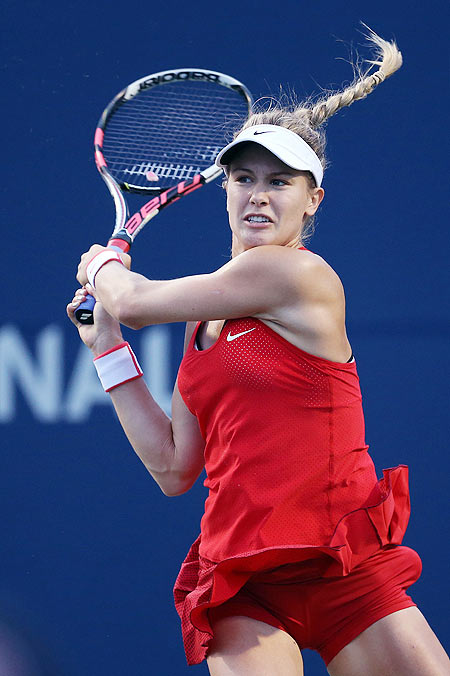 Canada's Eugenie Bouchard plays a shot against Switzerland's Belinda Bencic during their Rogers Cup match at the Aviva Centre in Toronto on Tuesday