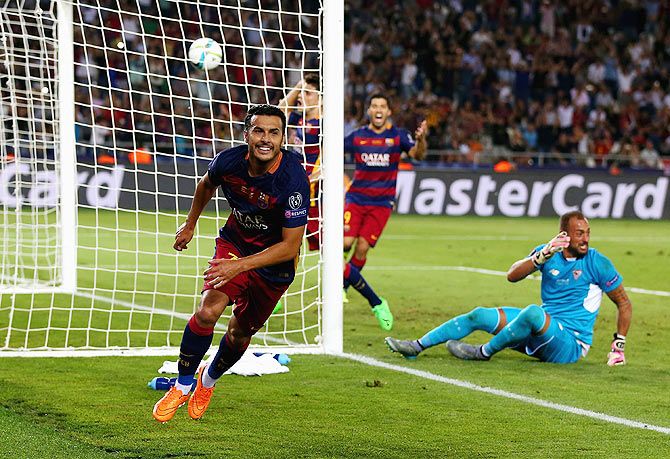Barcelona's Pedro celebrates scoring the extra-time winner past Sevilla'S Beto