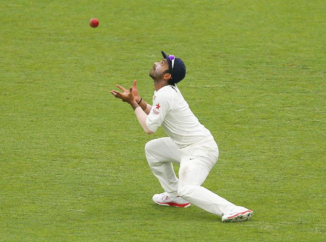 rahane-first-fielder-to-take-8-catches-in-a-test-rediff-cricket