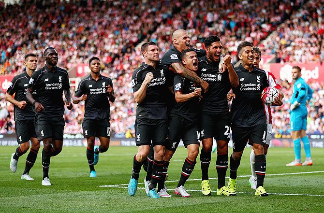 Liverpool players celebrate the winning goal against Stoke City at Britannia Stadium on August 9 in Stoke on Trent, England