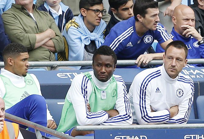 Chelsea's John Terry sat on the bench after being substituted at half time during the Premier League match against Manchester City