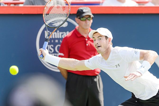 Great Britain's Andy Murray plays a return against Serbia's Novak Djokovic during their Rogers Cup final at Uniprix Stadium in Montreal on Sunday