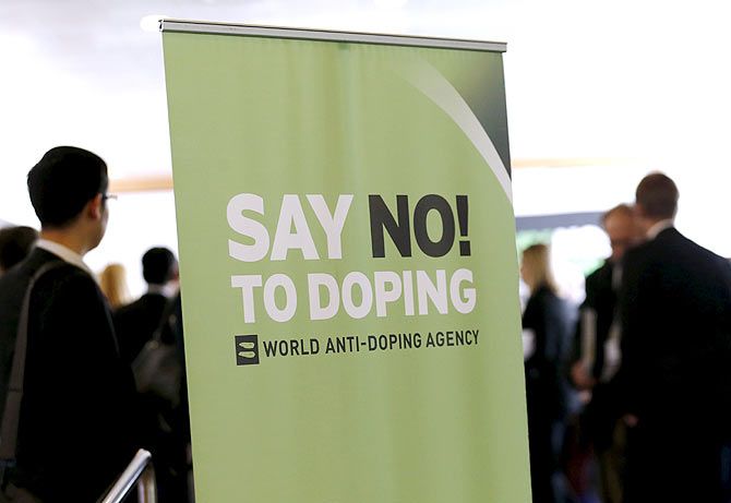  Participants talk before the start of the World Anti-Doping Agency (WADA) Symposium for Anti-Doping Organizations in Lausanne