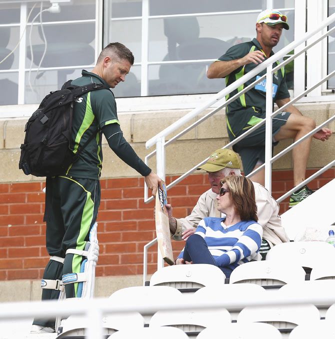 Australia captain Michael Clarke speaks with his grandfather, Ray and mother Debbie during a nets session ahead of the 5th Ashes Test at The Kia Oval in London on Wednesday