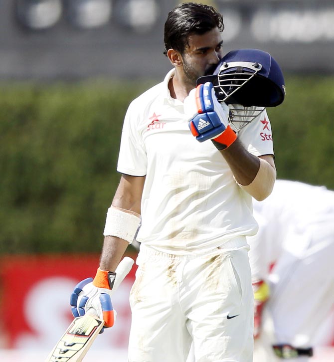 K L Rahul kisses his India cap after registering his second Test hundred, on Day 1 of the second Test against Sri Lanka