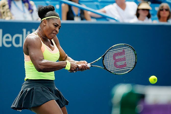 USA's Serena Williams returns a shot to Bulgaria Tsvetana Pironkova