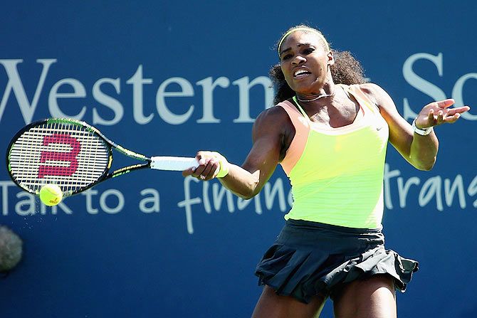 USA's Serena Williams returns a forehand to Italy's Karin Knapp
