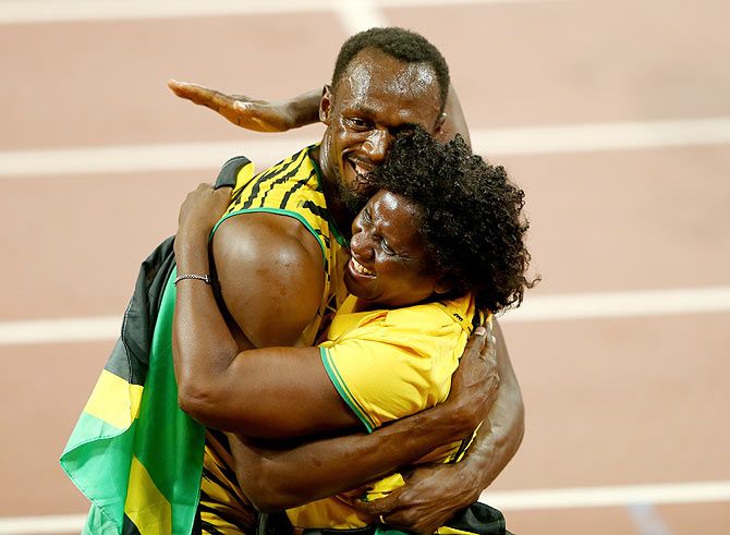Jamaica's Usain Bolt celebrates with his mother Jennifer Bolt after winning gold in the Men's 100 metres final on Day 2 of the 15th IAAF World Athletics Championships at Beijing National Stadium in Beijing, China on Sunday, August 23