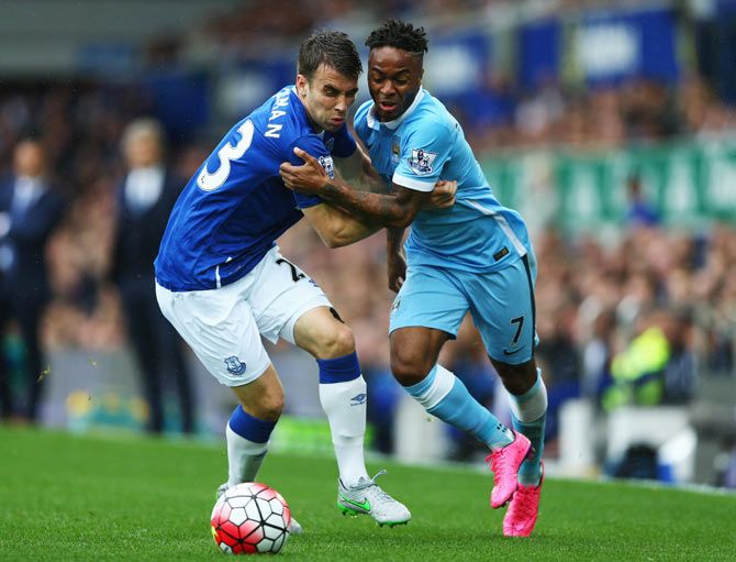 Manchester City's Raheem Sterling takes on Everton's Seamus Coleman during their Barclays English Premier League match at Goodison Park in Liverpool on Sunday