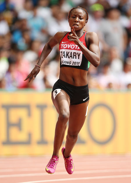 Kenya's Joyce Zakary competes in the Women's 400 metres heats during day three of the 15th IAAF World Athletics Championships at Beijing National Stadium in Beijing on August 24
