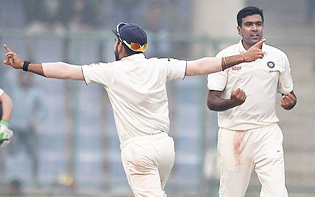 India's R Ashwin celebrates the dismissal of South Africa's J P Duminy during final day of the fourth Test match at Feroz Shah Kotla Stadium in New Delhi on Monday
