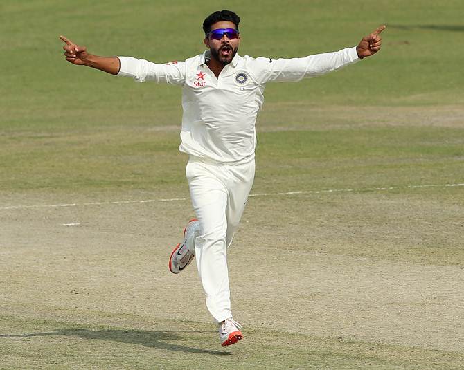 Ravindra Jadeja celebrates taking a wicket 