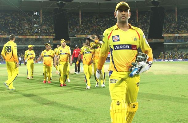 Chennai Super Kings captain MS Dhoni leads his side back to the pavilion.