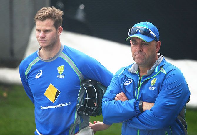 Australia captain Steve Smith and coach Darren Lehmann look on during a nets session at Blundstone Arena in Hobart