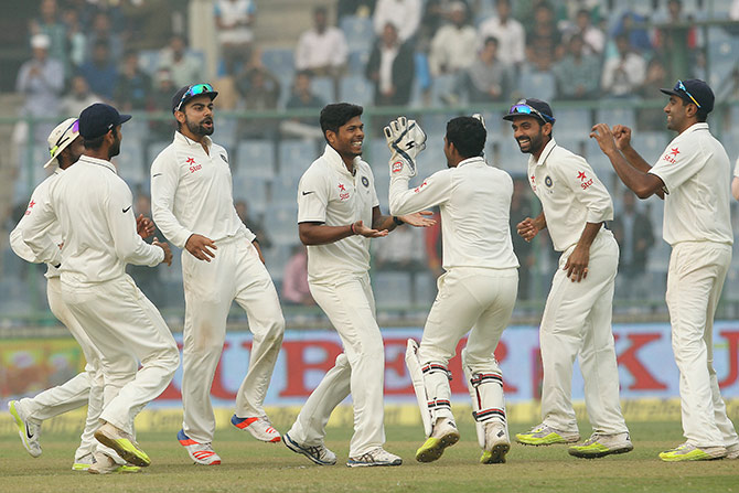 Indian players celebrate a South African wicket  