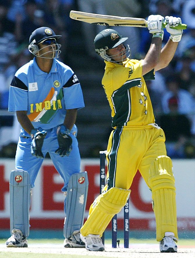 Australia's Ricky Ponting (right) hits a six as India's wicketkeeper, Rahul Dravid, looks on during the 2003 cricket World Cup final at the Wanderers Stadium in Johannesburg
