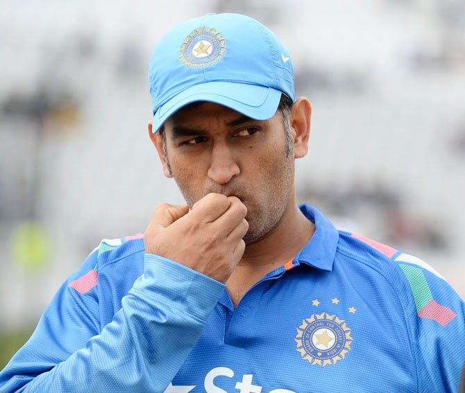 India captain Mahendra Singh Dhoni looks on