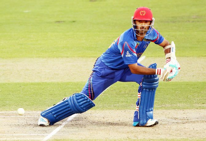 Nawroz Mangal of Afghanistan bats during the warm-up match against India
