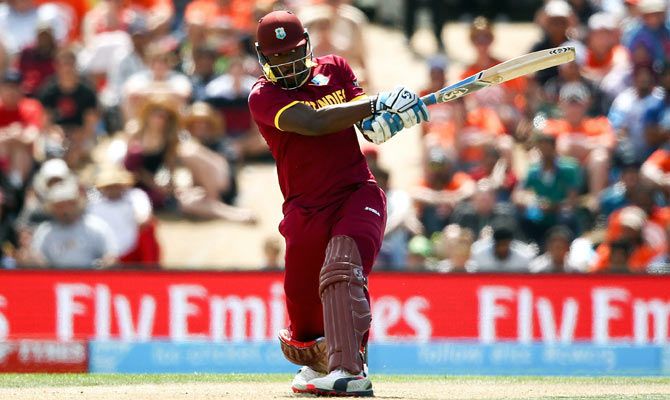 Andre Russell of West Indies hits out