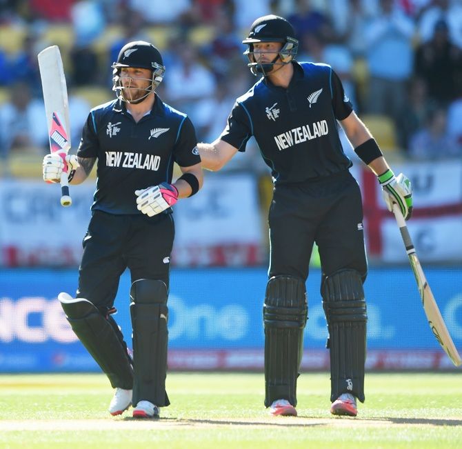New Zealand captain Brendon McCullum is congratulated by teammate Martin Guptil