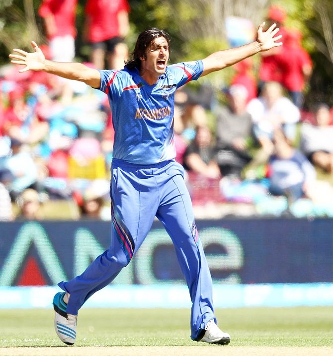 Shapoor Zadran of Afghanistan celebrates a wicket