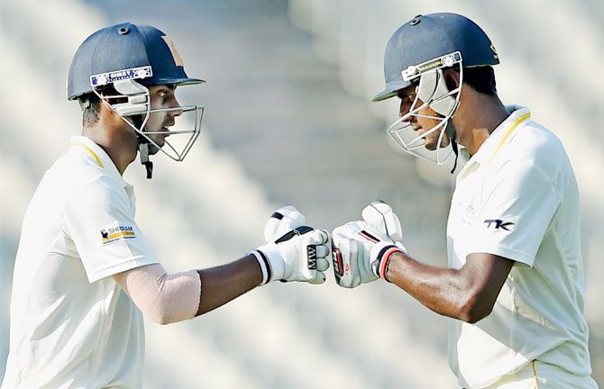  Tamil Nadu batsmen Ramaswamy Prasanna and Baba Indrajit greets each other